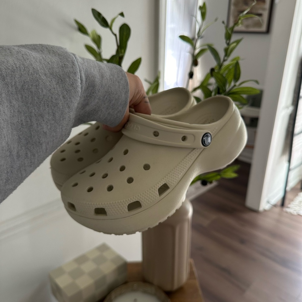Women’s Platform Crocs in the color bone in a size 7